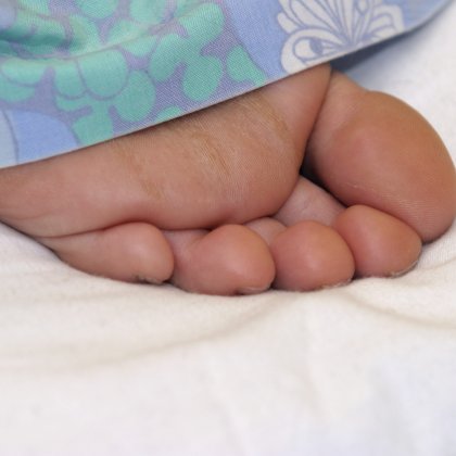 A human foot of someone sleeping